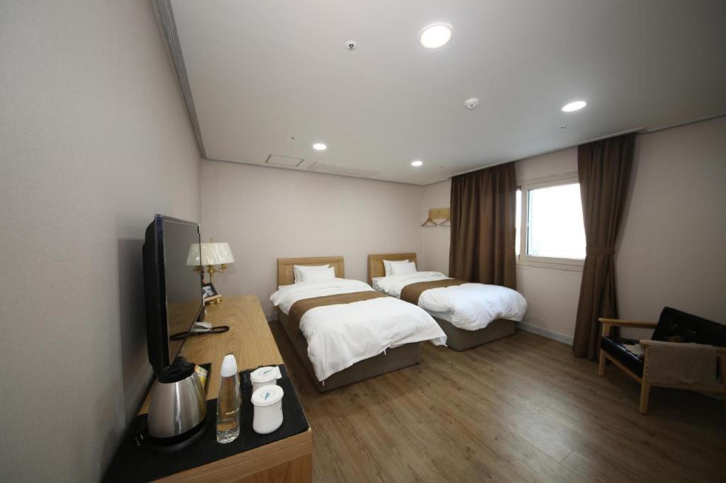 Hotel Aroha Seogwipo-stad Buitenkant foto